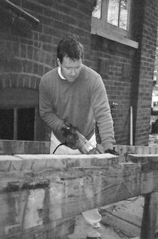 DuPage Decks based in Lombard IL. - Here's Frank cutting down a wheel chair ramp on a two flat in Chicago