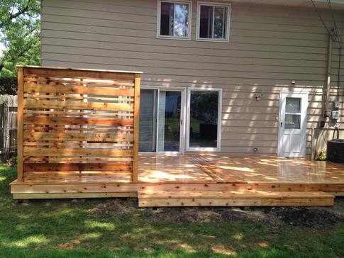 Deck privacy (semi) screen. A-Affordable Decks in Lombard